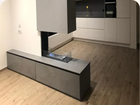 Biocamino passante integrato in un mobile living
